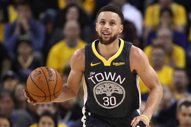 Stephen Curry #30 of the Golden State Warriors OAKLAND, CALIFORNIA - MAY 16: Stephen Curry #30 of the Golden State Warriors controls the ball against the Portland Trail Blazers in game two of the NBA Western Conference Finals at ORACLE Arena on May 16, 2019 in Oakland, California. NOTE TO USER: User e