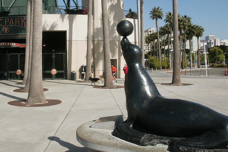 Seals Plaza at Oracle Park in San Francisco SAN FRANCISCO - JUNE 21: A general view of the Marina gate entrance to SBC Park, home of the San Francisco Giants before the MLB game against the Los Angeles Dodgers on June 21, 2004 in San Francisco, California. (Photo by Jed Jacobsohn/Getty Images)