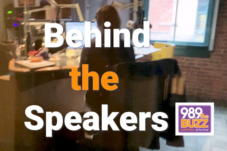 Behind the Speakers