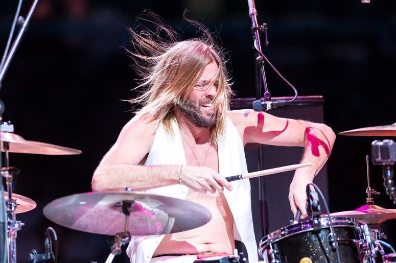 Taylor Hawkins of the band Chevy Metal performs following the NBA game between the Charlotte Hornets and Milwaukee Bucks Taylor Hawkins of the band Chevy Metal performs following the NBA game between the Charlotte Hornets and Milwaukee Bucks