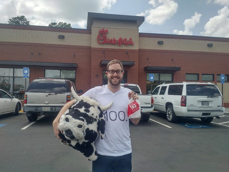David Holding Cow Head
