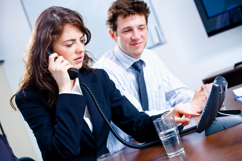 Coworkers on Phone