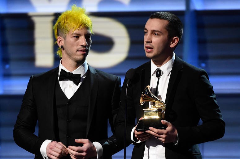 Josh Dun (L) and Tyler Joseph of Twenty One Pilots accept the Best Pop Duo/Group Performance award Josh Dun (L) and Tyler Joseph of Twenty One Pilots accept the Best Pop Duo/Group Performance award