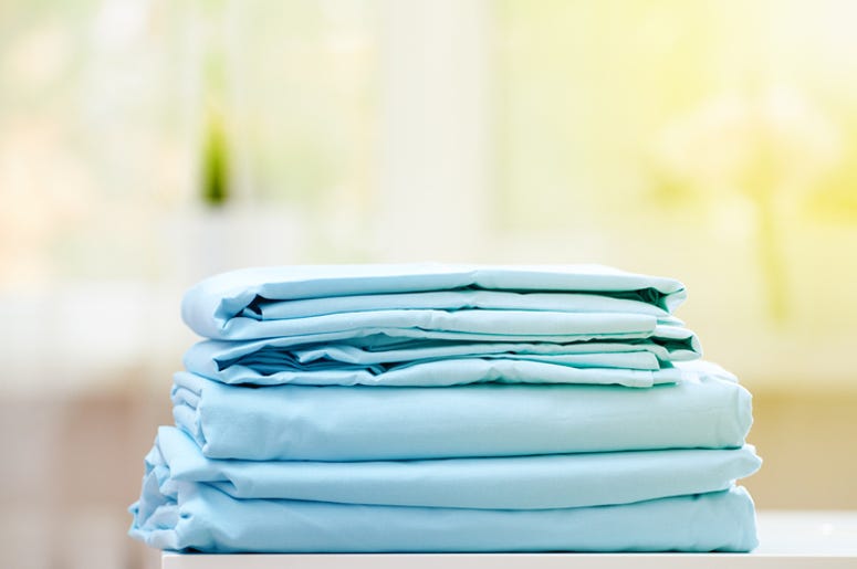 stack of bed sheets