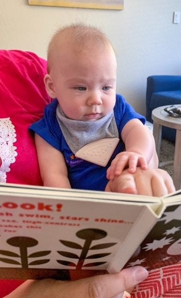 Kristen reading to Lilly
