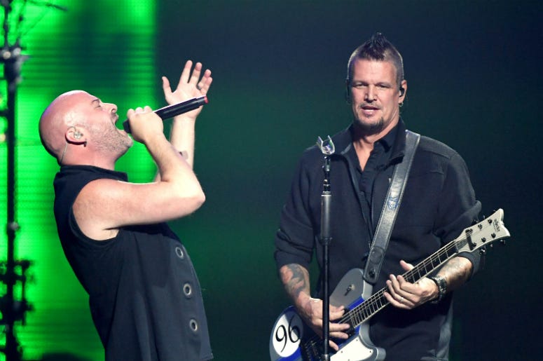 Singer David Draiman (L) and guitarist Dan Donegan of Disturbed perform Singer David Draiman (L) and guitarist Dan Donegan of Disturbed perform