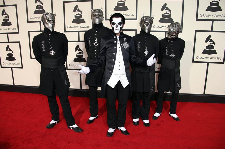 Members of the band Ghost arrive on the red carpet during the 58th Grammy Awards Members of the band Ghost arrive on the red carpet during the 58th Grammy Awards