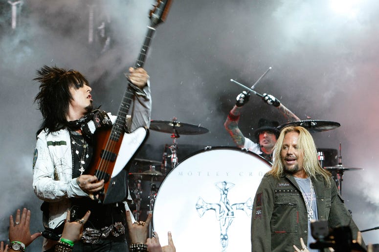Nikki Sixx, Tommy Lee and singer Vince Neil of Motley Crue perform during a press conference annoucing Crue Fest 2008 Nikki Sixx, Tommy Lee and singer Vince Neil of Motley Crue perform during a press conference annoucing Crue Fest 2008