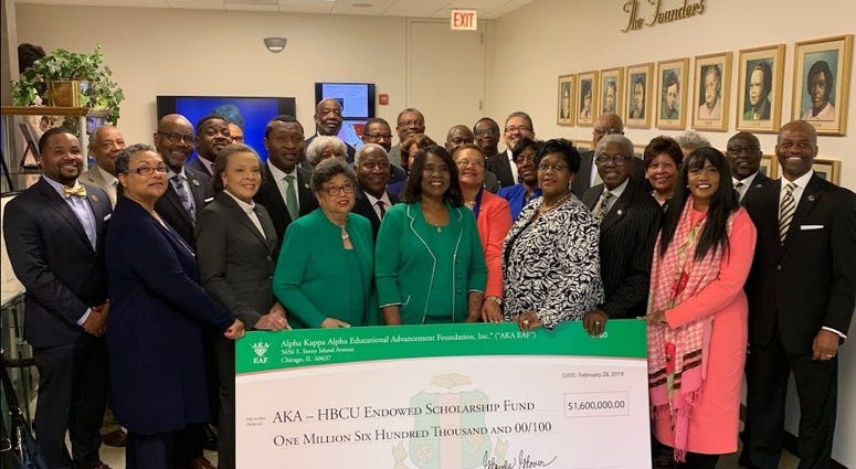 Alpha Kappa Alpha International President Dr. Glenda Glover presents a check to HBCU representatives in 2019