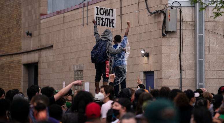 MINNEAPOLIS, MN - MAY 26: Protesters demonstrate against the death of George Floyd GettyImages-1215377181.jpg