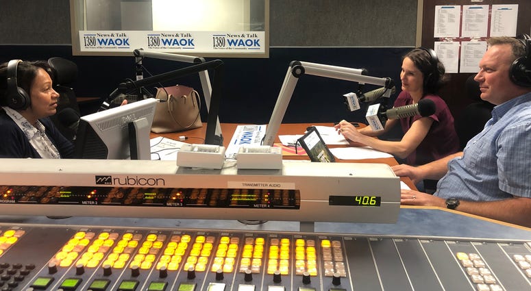 Mary Gill with Ben & Amanda Fowler of Views Media inside WAOK studios in Atlanta, GA 7/20/19 Mary Gill with Ben & Amanda Fowler of Views Media