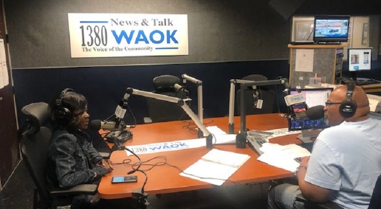 Derrick Boazman with Sports Agent Tiffany Porter in WAOK studios in Atlanta, GA 8/20/19 Derrick Boazman with Sports Agent Tiffany Porter