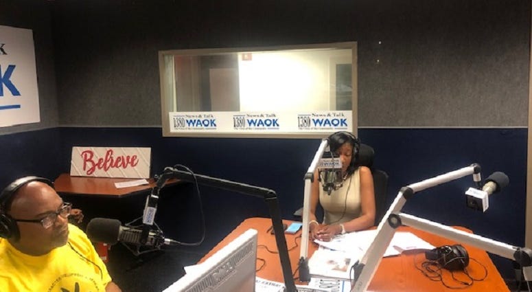 Derrick Boazman with Fulton County Commissioner Natalie Hall in WAOK Studios 9/30/19 Derrick Boazman with Fulton County Commissioner Natalie Hall