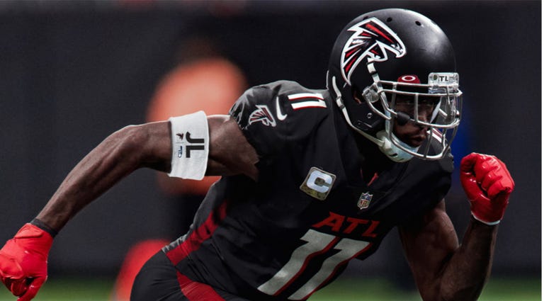 The Atlanta Falcons honored late Congressman John Lewis by wearing white armbands with his initials