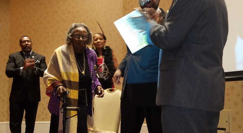 Mrs. Juanita Abernathy walks across the stage during an NAACP event earlier this year Mrs. Juanita Abernathy walks across the stage during an NAACP event earlier this year