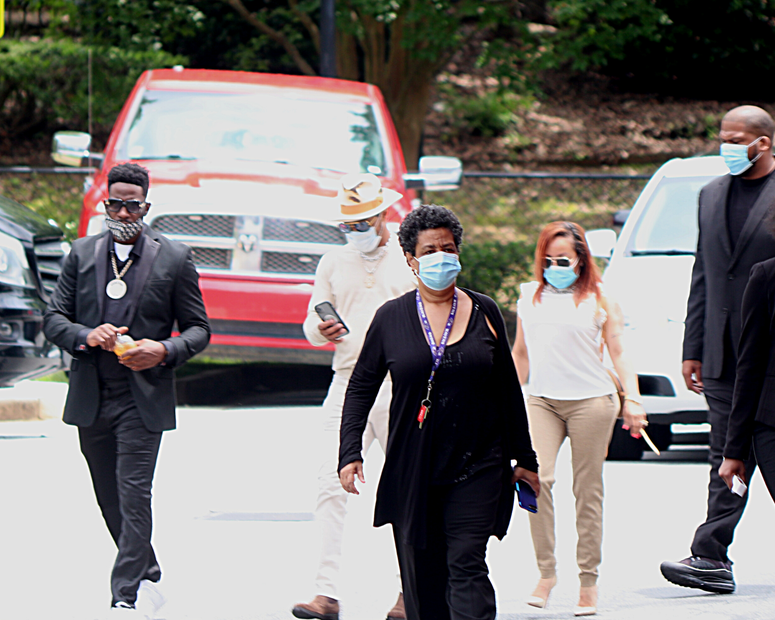 TI and Tiny Harris at Rayshard Brooks Funeral