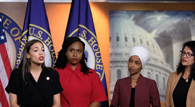 U.S Rep. Alexandria Ocasio-Cortez, speaks as Reps. Ayanna Pressley,IIhan Omar, Rashida Tlaib Listen July 15,2019 Washington D.C. U.S Rep. Alexandria Ocasio-Cortez, speaks in Washington D.C.