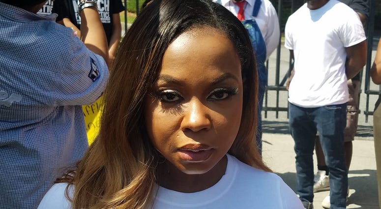Phaedra Parks, of Real Housewives of Atlanta fame, joined in the protest against Waffle House Friday in metro Atlanta.
