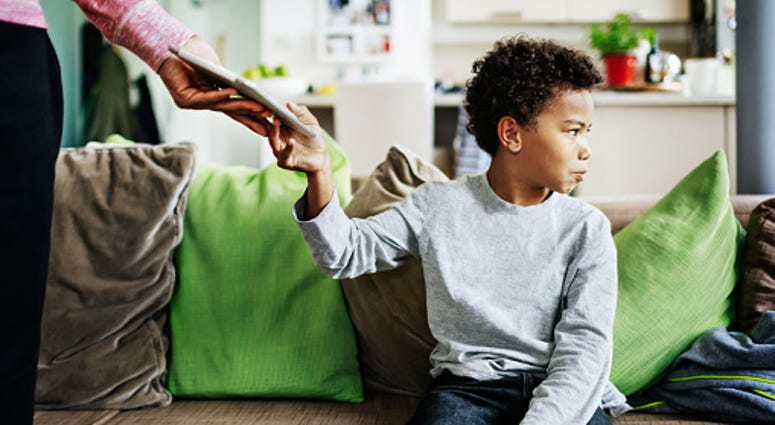 Father Punishes Son By Taking Tablet Off Him Father Punishes Son By Taking Tablet Off Him