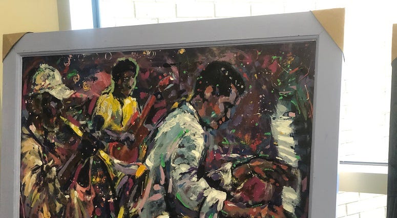 Artist Gilbert Young Piece being shown at the Day of The Arts WAOK. Artist Gilbert Young Piece