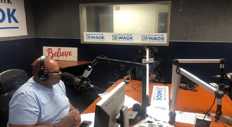 Derrick Boazman with Sports Agent Tiffany Porter in WAOK studios in Atlanta, GA 8/20/19 Derrick Boazman with Sports Agent Tiffany Porter