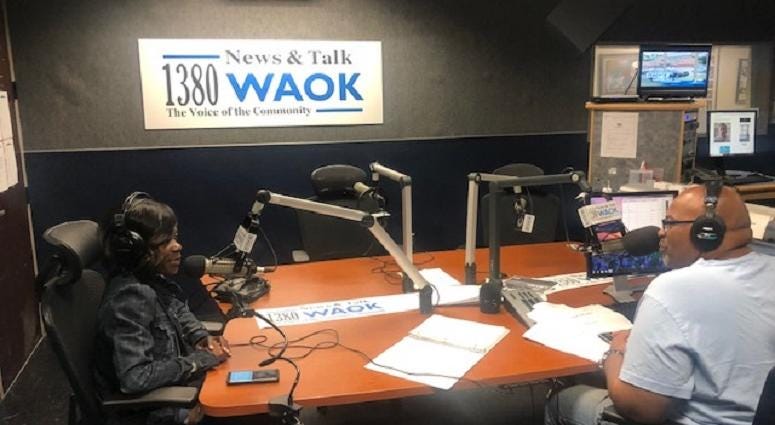 Derrick Boazman with Sports Agent Tiffany Porter in WAOK studios in Atlanta, GA 8/20/19 Derrick Boazman with Sports Agent Tiffany Porter