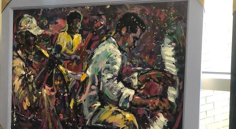 Artist Gilbert Young Piece being shown at the Day of The Arts WAOK. Artist Gilbert Young Piece