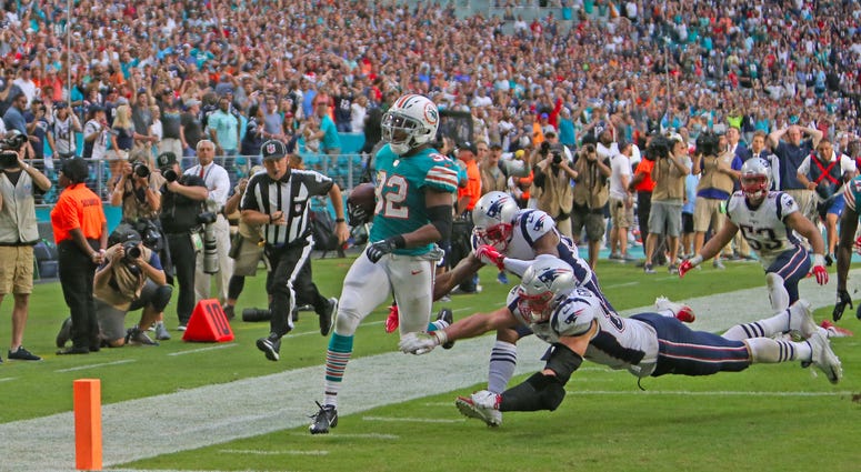 Kenyan Drake crossing goal line Miami Miracle