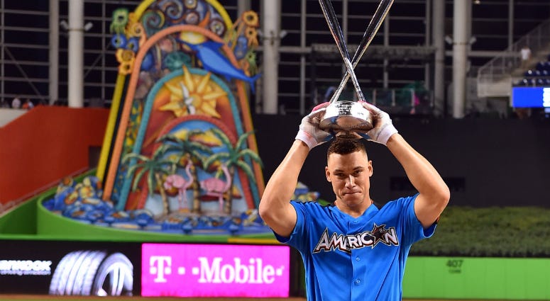American League outfielder Aaron Judge (99) of the New York Yankees holds up the trophy after winning the 2017 MLB Home Run Derby at Marlins Park. American League outfielder Aaron Judge (99) of the New York Yankees holds up the trophy after winning the 2017 MLB Home Run Derby at Marlins Park.