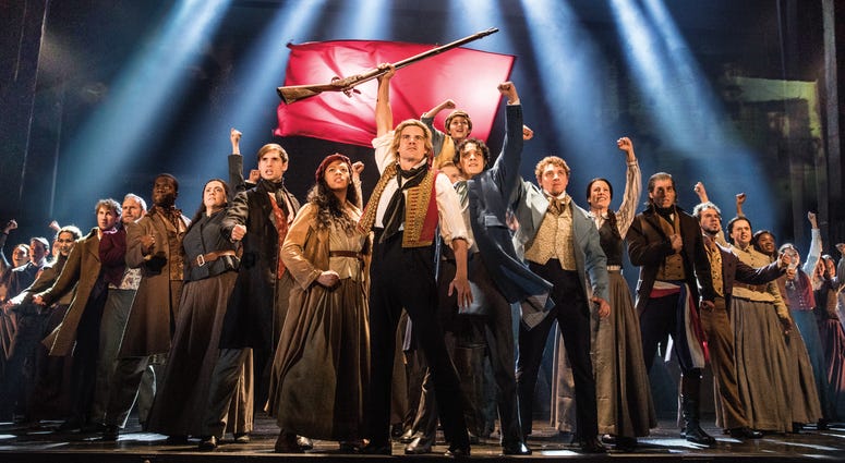 The company of LES MISÉRABLES performs “One Day More." The company of LES MISÉRABLES performs “One Day More."