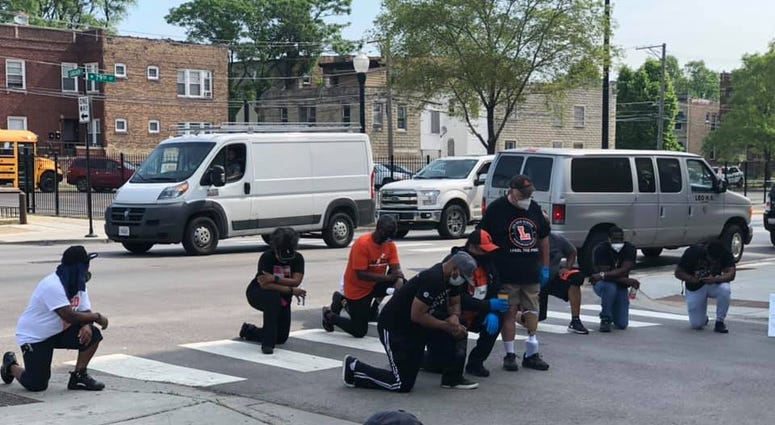 Students from Leo Catholic High School in the Auburn-Gresham neighborhood on Chicago’s South Side cleaned up 79th Street on Thursday, following several days of property damage and looting. Students from Leo Catholic High School in the Auburn-Gresham neighborhood on Chicago’s South Side cleaned up 79th Street on Thursday, following several days of property damage and looting.