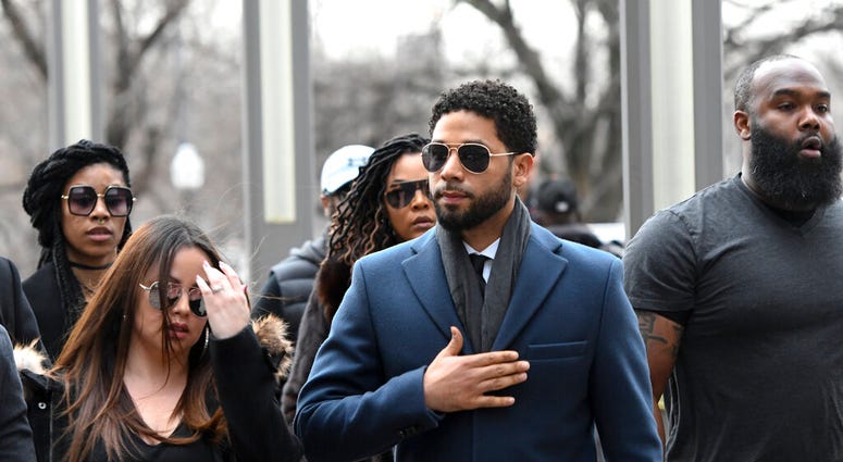Empire actor Jussie Smollett, center, arrives at the Leighton Criminal Court Building for his hearing on Thursday, March 14, 2019, in Chicago. Empire actor Jussie Smollett, center, arrives at the Leighton Criminal Court Building for his hearing on Thursday, March 14, 2019, in Chicago.