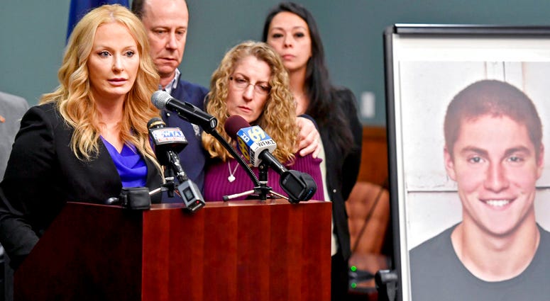 Centre County, Pa., District Attorney Stacy Parks Miller, left, announces findings in an investigation into the death of Penn State University fraternity pledge Tim Piazza, seen in photo at right