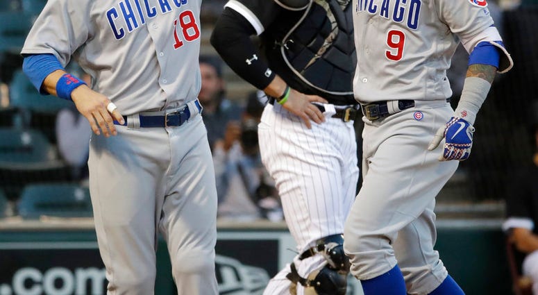 Chicago Cubs' Javier Baez, right, celebrates with Ben Zobrist after hitting a two-run home run against the Chicago White Sox during the first inning of a baseball game Saturday, Sept. 22, 2018, in Chicago. (AP Photo/Nam Y. Huh) Chicago Cubs' Javier Baez, right, celebrates with Ben Zobrist after hitting a two-run home run against the Chicago White Sox during the first inning of a baseball game Saturday, Sept. 22, 2018, in Chicago. (AP Photo/Nam Y. Huh)