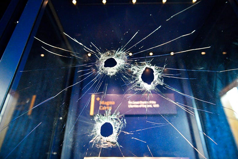 Hammer holes in the glass case that housed the Magna Carta, at Salisbury Cathedral after a 45-year-old man has been arrested on suspicion of its attempted theft, in Salisbury, England, Friday Oct. 26, 2018.