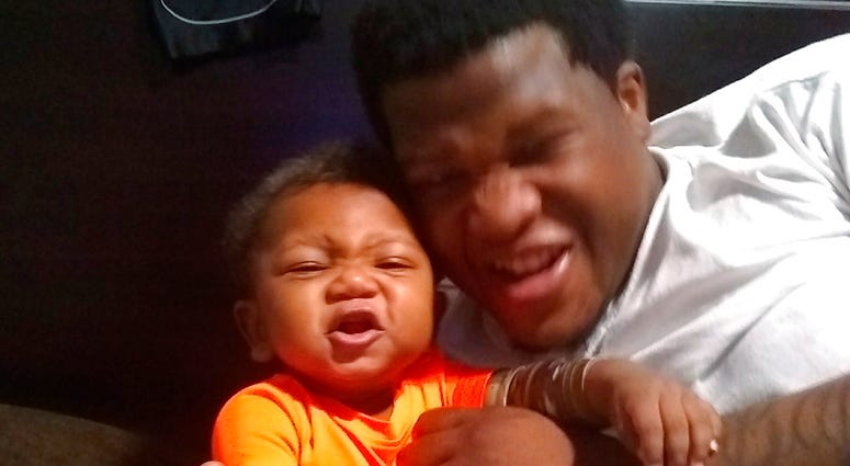 This photo provided by Avontea Boose shows her baby Tristan Roberson and the boy's father Jemel Roberson.