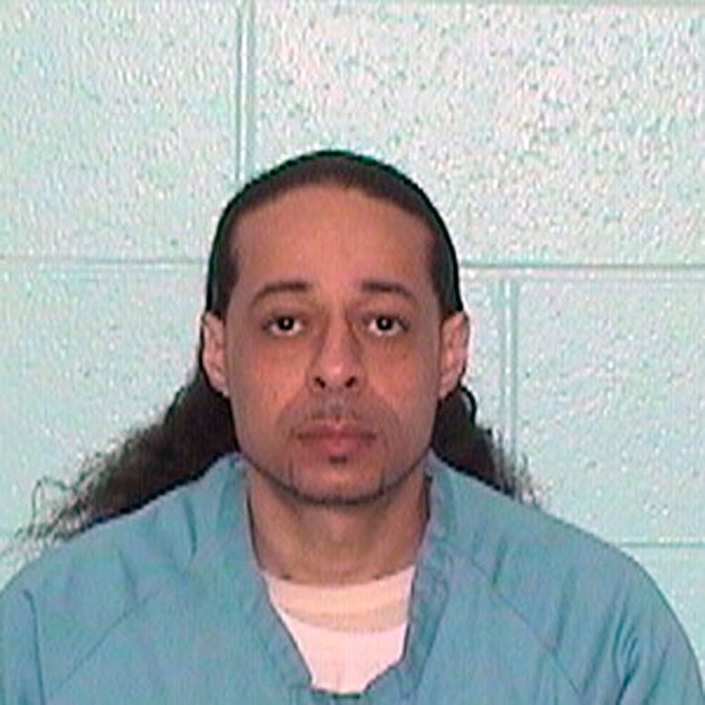 This undated booking photo released by Illinois Department of Corrections shows Floyd E. Brown. Illinois State Police say Brown, 39, suspected of shooting a sheriff's deputy and a woman Thursday, March 7, 2019 Floyd E. Brown