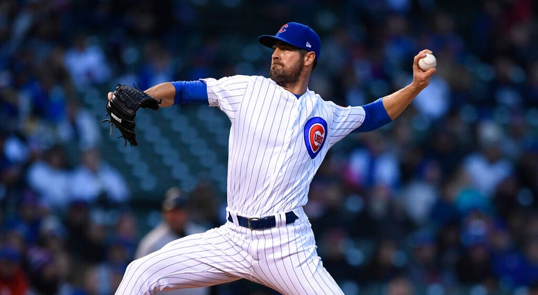Chicago Cubs starter Cole Hamels delivers a pitch during the first inning of a baseball game against the Miami Marlins, Monday, May 6, 2019, in Chicago. Chicago Cubs starter Cole Hamels delivers a pitch during the first inning of a baseball game against the Miami Marlins, Monday, May 6, 2019, in Chicago.