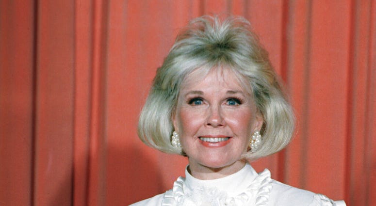 In this Jan. 28, 1989 file photo, actress and animal rights activist Doris Day poses for photos after receiving the Cecil B. DeMille Award she was presented with at the annual Golden Globe Awards ceremony in Los Angeles. In this Jan. 28, 1989 file photo, actress and animal rights activist Doris Day poses for photos after receiving the Cecil B. DeMille Award she was presented with at the annual Golden Globe Awards ceremony in Los Angeles.