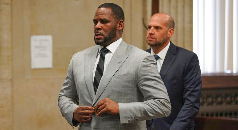 In this June 6, 2019, file photo, singer R. Kelly pleaded not guilty to 11 additional sex-related felonies during a court hearing before Judge Lawrence Flood at Leighton Criminal Court Building in Chicago. In this June 6, 2019, file photo, singer R. Kelly pleaded not guilty to 11 additional sex-related felonies during a court hearing before Judge Lawrence Flood at Leighton Criminal Court Building in Chicago.