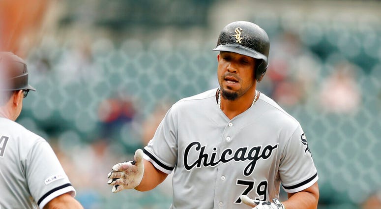 Chicago White Sox's Jose Abreu is greeted by third base coach Nick Capra after a solo home run during the first inning of the first game of a baseball doubleheader against the Detroit Tigers, Tuesday, Aug. 6, 2019, in Detroit. Chicago White Sox's Jose Abreu is greeted by third base coach Nick Capra after a solo home run during the first inning of the first game of a baseball doubleheader against the Detroit Tigers, Tuesday, Aug. 6, 2019, in Detroit.