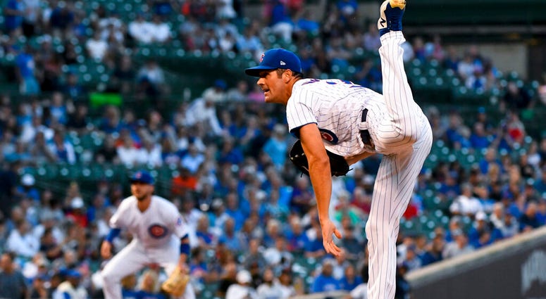 Chicago Cubs starting pitcher Cole Hamels watches a throw during the first inning of the team's baseball game against the San Francisco Giants on Tuesday, Aug. 20, 2019, in Chicago. Chicago Cubs starting pitcher Cole Hamels watches a throw during the first inning of the team's baseball game against the San Francisco Giants on Tuesday, Aug. 20, 2019, in Chicago.
