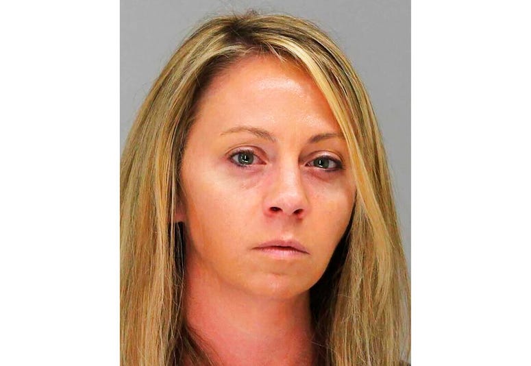 This Tuesday, Oct. 1, 2019, booking photo provided by the Dallas County Sheriff's Department shows former Dallas Police Officer Amber Guyger. Guyger, who shot her black unarmed neighbor Botham Jean to death after, she said, mistaking his apartment for her