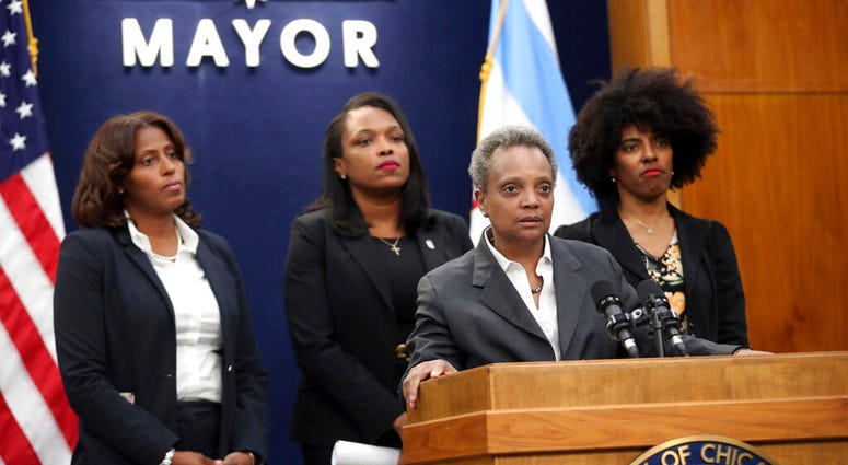 Mayor Lori Lightfoot, joined by Chicago Public Schools CEO Janice Jackson, rear center, makes a statement about the Chicago Teachers Union strike Tuesday, Oct. 29, 2019, at City Hall in Chicago. Mayor Lori Lightfoot, joined by Chicago Public Schools CEO Janice Jackson, rear center, makes a statement about the Chicago Teachers Union strike Tuesday, Oct. 29, 2019, at City Hall in Chicago.