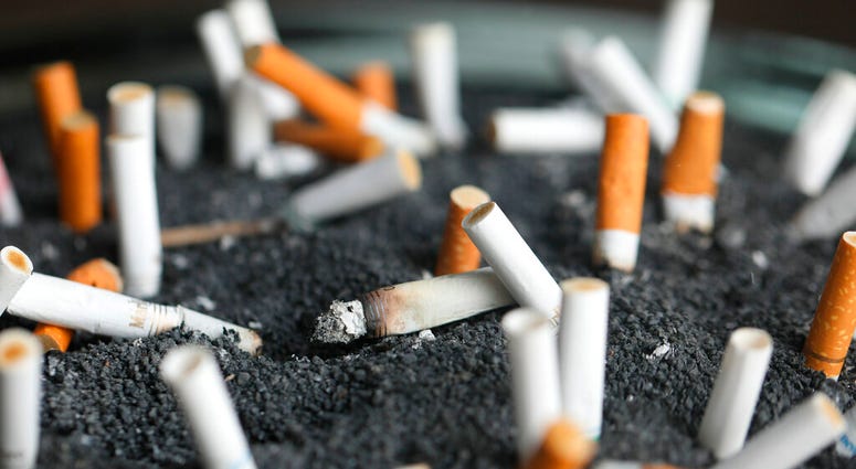 cigarette butts in an ashtray cigarette butts in an ashtray