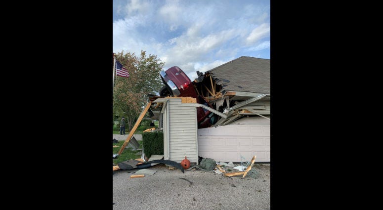 Police say a Wisconsin man was arrested after crashing a pickup truck into the roof of a Beloit home. Police say a Wisconsin man was arrested after crashing a pickup truck into the roof of a Beloit home.