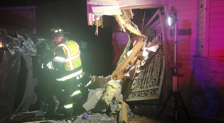 A stolen vehicle crashed early Thursday morning into a home in suburban Beach Park. A stolen vehicle crashed early Thursday morning into a home in suburban Beach Park.