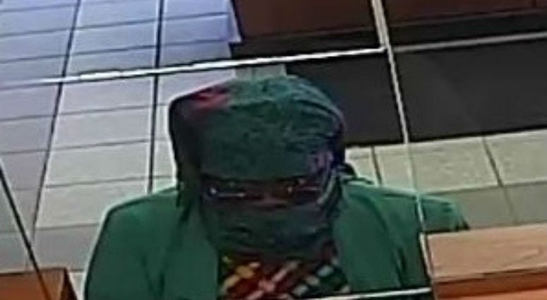 Surveillance image of the suspect in a bank robbery Aug. 15, 2019, at the Byline Bank at 8400 Skokie Blvd. in Skokie. Surveillance image of the suspect in a bank robbery Aug. 15, 2019, at the Byline Bank at 8400 Skokie Blvd. in Skokie.
