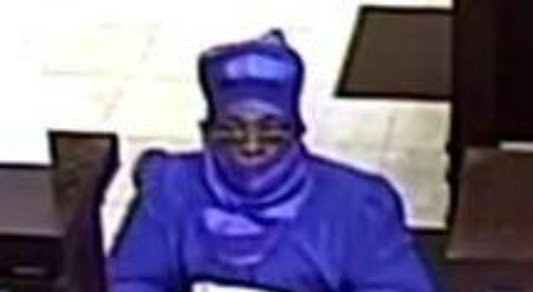 Surveillance image of the suspect in a bank robbery Aug. 15, 2019, at the Wintrust Bank at 7555 N. Western Ave. Surveillance image of the suspect in a bank robbery Aug. 15, 2019, at the Wintrust Bank at 7555 N. Western Ave.