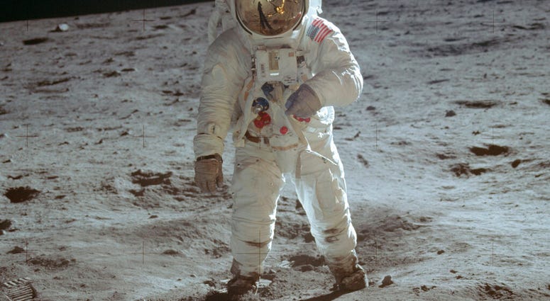 In this July 20, 1969 photo made available by NASA, astronaut Buzz Aldrin, lunar module pilot, walks on the surface of the moon during the Apollo 11 extravehicular activity. In this July 20, 1969 photo made available by NASA, astronaut Buzz Aldrin, lunar module pilot, walks on the surface of the moon during the Apollo 11 extravehicular activity.